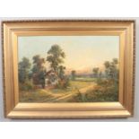 Aubrey Ramus (1895-1950), a pair of gilt framed oils on canvas. Rural evening scenes with