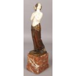 B Grundmann, a German Art Deco bronze and ivory figure of a semi nude maiden on marble plinth. 30.