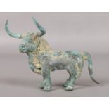 Possibly antiquity, a Chinese bronze model of a bull. Height 10.5cm, Length 14cm.