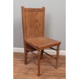 An early 20th century V.G Bond & Sons oak chair incorporating trouser press to the back. With