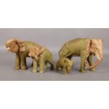A collection of four Beswick elephants in various sizes. Tallest: H: 17.5cm. Damage to the tusks.