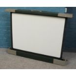 An 'Autorect' folding projector screen by Johnson's of Hendon.