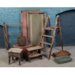 A collection of wooden items; to include vintage deckchairs, stepladders, wicker basket and