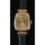 A 18ct gold electroplated Raymond Weil ladies quartz wrist watch. Comes with genuine calf leather