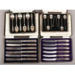 Four cased sets of silver and silver handled flatware. Including set of six teaspoons, demitasse