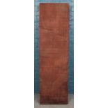 A very large slab of mahogany. Dimensions: 183cm x 53cm x 11cm.