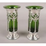 A pair of weighted pierced silver vases with green glass liner. 290g without glass. Assayed