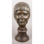 A composite bronzed bust. Signed Julie 76.