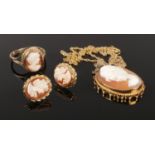 A collection of cameo jewellery. Includes pair of 18ct gold earrings, 9ct gold ring and a yellow