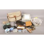 A collection of fly fishing equipment. To include three wallets of wet flys & lures, vice and