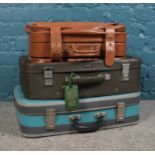 Three vintage suitcases. To include a vintage Antler case.