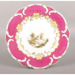 A Rockingham Porcelain Dessert Plate c.1831-1842 painted with a landscape in the centre. The