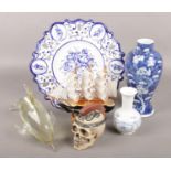 An assortment of items. Includes Chinese blue and white prunus blossom vase (22.5cm), glass dolphin,