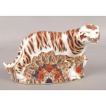 A Royal Crown Derby Bengal Tiger paperweight. With gold stopper. (13.5cm height)