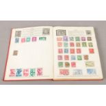 A stamp album of British & World stamps.