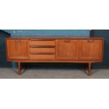 A Stonehill Furniture teak sideboard. Height 72.5cm, Width 182cm, Depth 43.5cm.