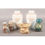 A small collection of ceramic and glass vases. Includes Sylvac, pair of Wedgwood Venus, oriental and