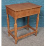 A light oak side table with drawer. (66cm x 56cm) Missing handle.