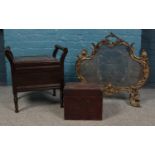 A brass pieced fire screen, mahogany piano stool and trinket box.