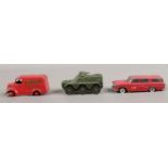 Three vintage Dinky Toy vehicles. No. 257 Fire Chief, No 451 Dunlop Trojan van, Armoured personnel