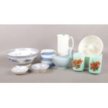 An assortment of blue and white miscellaneous. To include two painted glass tumblers, two ceramic