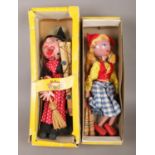 Two boxed Pelham puppets. To include the Witch & Dutch girl.