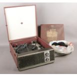 A Marconiphone record player with a selection of 78's and loose 45's. Artists to include Pyramids,