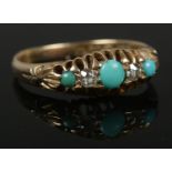 An 18ct Gold and 5 stone turquoise and diamond ring. Largest diamond: 1/16ct. Size R. Total