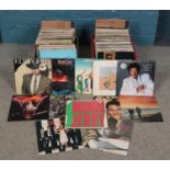 Two boxes of Vinyl LP records. To include Simply Red, Blondie, Level 42, Ultravox etc.