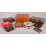 A collection of storage boxes, vintage tins and strong boxes.