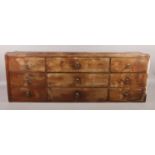 A small bank of watchmakers drawers, possibly from the interior of a bureau. Width: 89cm, Height: