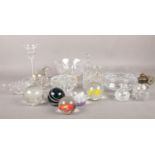 A collection of glassware. Stuart cut crystal candlestick, paperweights, cut crystal atomiser etc