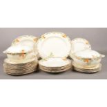 A quantity of Alfred Meakin ceramic dinner ware. Plates , lidded tureens. chip to lid on one tureen