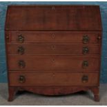 A Victorian mahogany four drawer bureau. Height: 111cm, Width: 108cm, Depth: 50cm. Back left foot