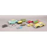 A selection of tin plate, die-cast and boxed vehicles. To include a boxed Saab 9.5 Aero, tin plate