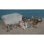 A box of assorted metalwares. To include silver plated teapot, small candelabra, and vase etc.
