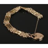 A 9ct Gold chain link bracelet, with 9ct Gold padlock. Total weight: 8.59g.