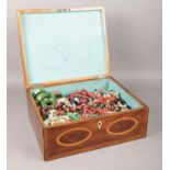 A large Victorian jewellery box with highlighted escutcheon containing an assortment of costume