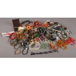 A quantity of costume jewellery. Beads, bangles, necklaces etc