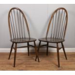Two Ercol spindle back dining chairs