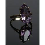 A 9ct gold ring set with a single amethyst stone. Size L. 2.91g.