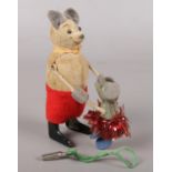 A Schuco clockwork figure group of dancing mice. With key.
