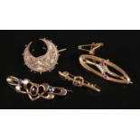 Four Victorian 9ct gold brooches. Includes two colour crescent example.
