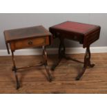Two mahogany sofa tables, with central stretchers and lyre supports. On claw feet, raised on