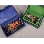 Two small jewellery boxes with contents of vintage and antique costume jewellery.