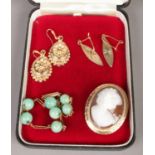 A collection of mostly 9ct gold jewellery. Includes green hardstone bracelet, earrings, cameo brooch