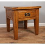 A modern hardwood side table with drawer: H: 60cm W:60cm D:60cm.