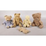 Five vintage teddy bears, including jointed examples.