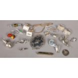 A quantity of mostly silver jewellery. Including brooches, cufflinks, tie clip, etc.