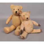 Two vintage fully jointed teddy bears. Largest: H: 54cm. One bear has eye missing and both are